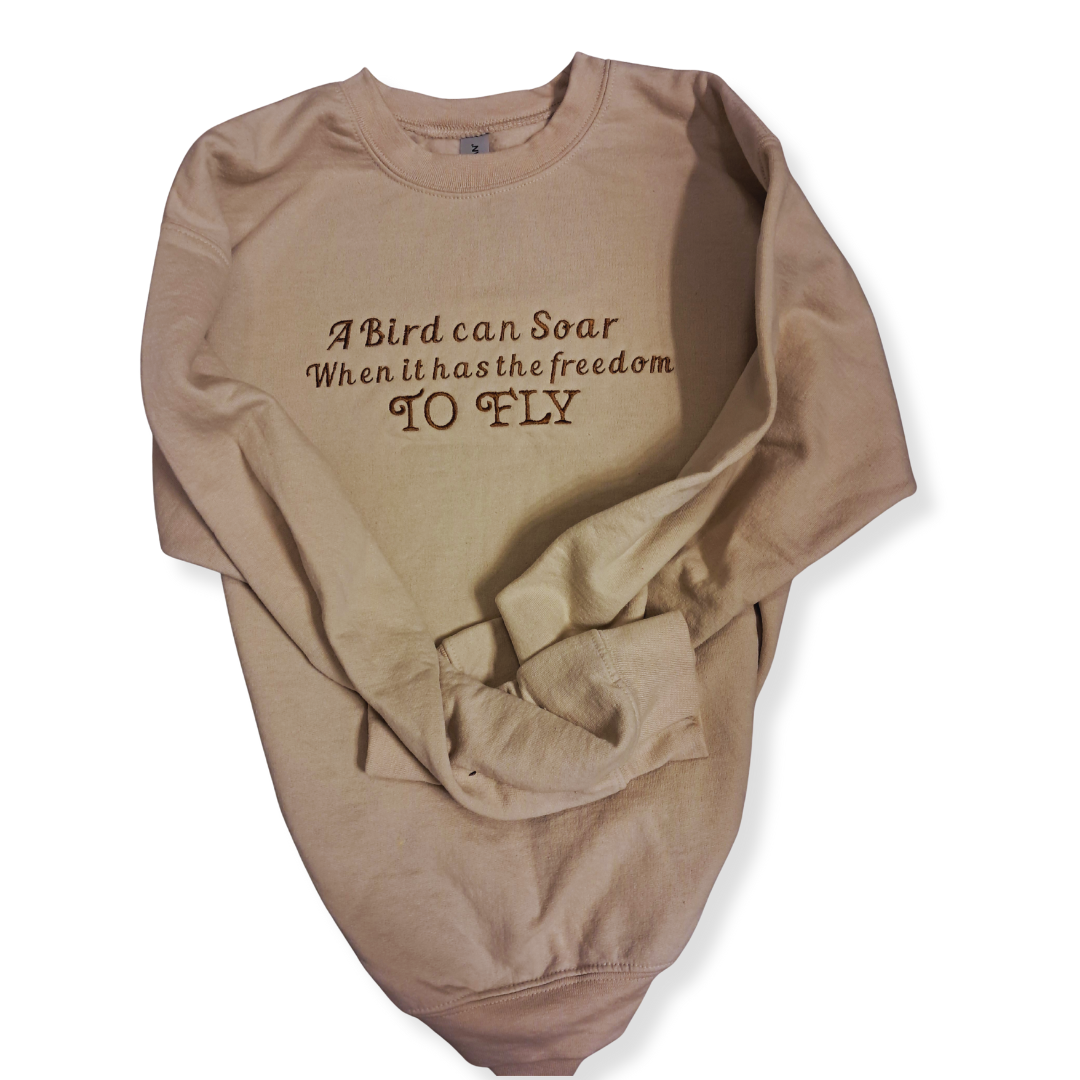 Embroidered "A Bird Can Soar" Crew Neck (Tan)
